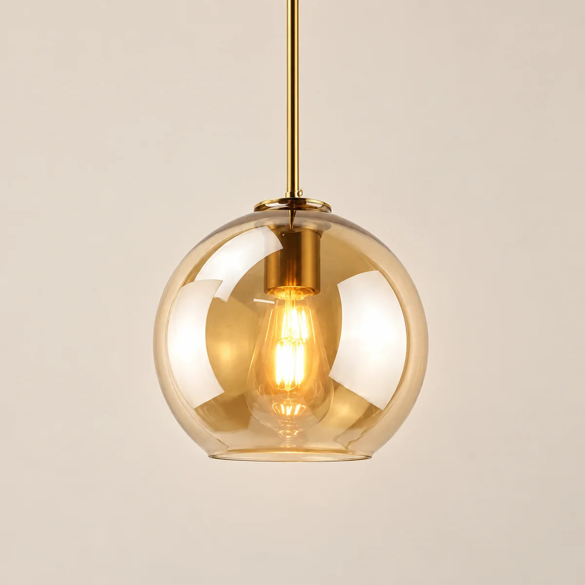 Suspension Sète cuivre, verre ambré, boule en verre